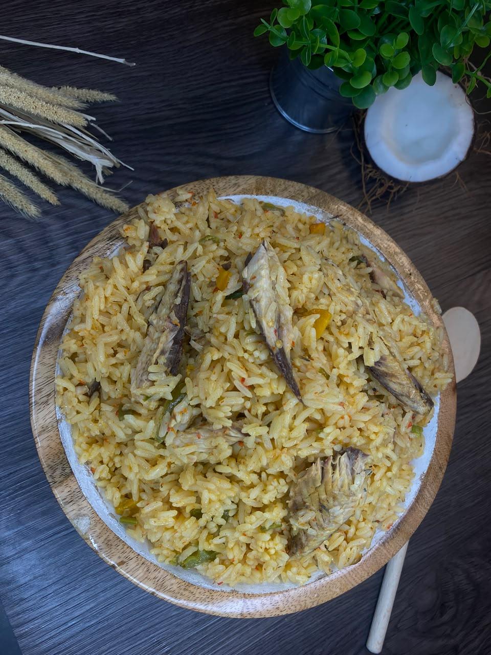 NVO rice and fish served in a wooden bowl